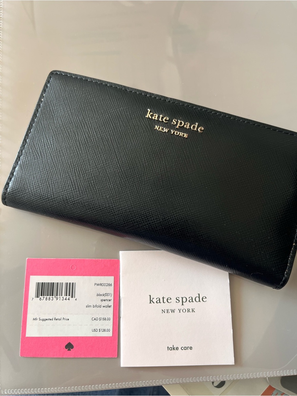 kate spade Black Saffiano Slim Bifold Wallet Spencer